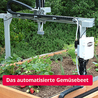 The team from the Department of Environmental Engineering and Applied Computer Science is installing a FarmBot.