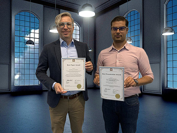 Carsten Röcker (li.) und Hitesh Dhiman (re.) freuen sich über die Auszeichnungen